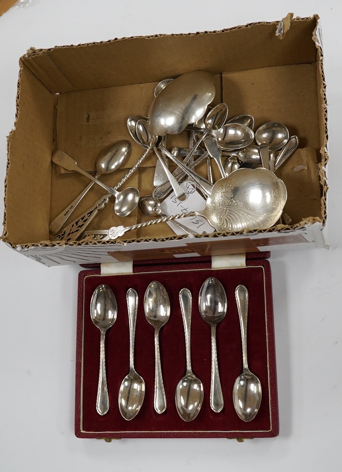 A pair of Edwardian silver serving spoons, Sheffield, 1901, 21.6cm and a quantity of assorted minor silver flatware. Condition - poor to fair